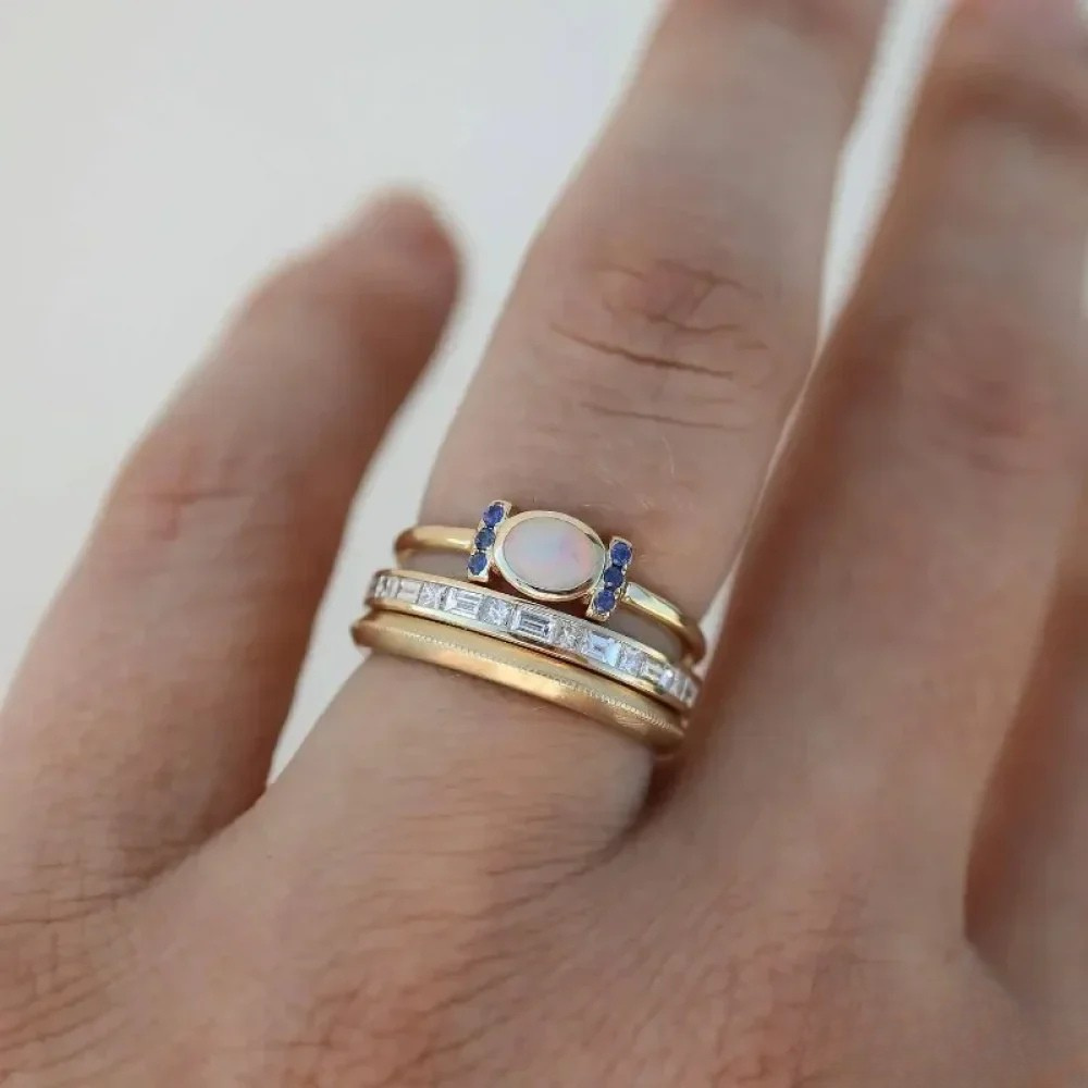 Sæt af vintage guldringe med opal