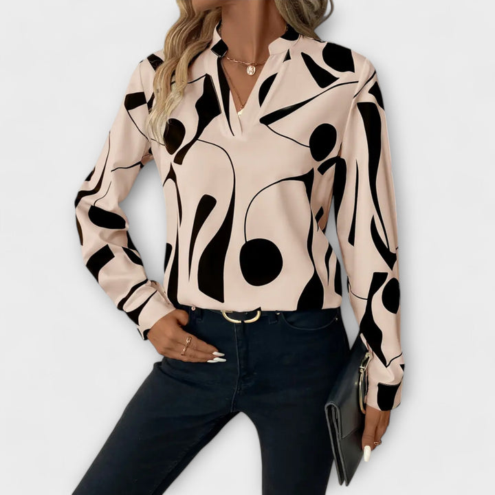 Elegant langærmet bluse med spids halsudskæring