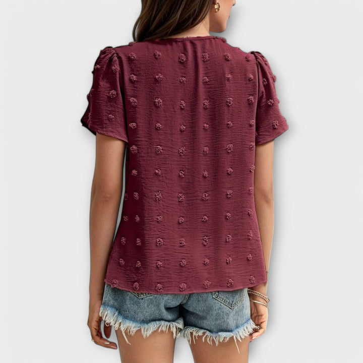Lene - Den perfekte prikkede bluse