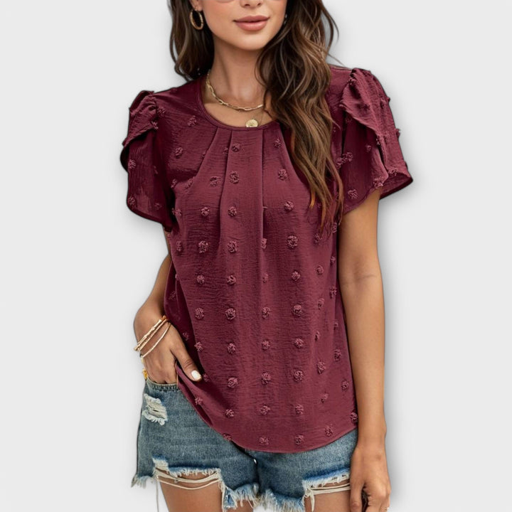 Lene - Den perfekte prikkede bluse