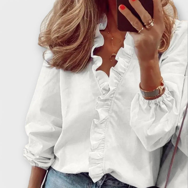 Marianne - Elegant bluse med flæser