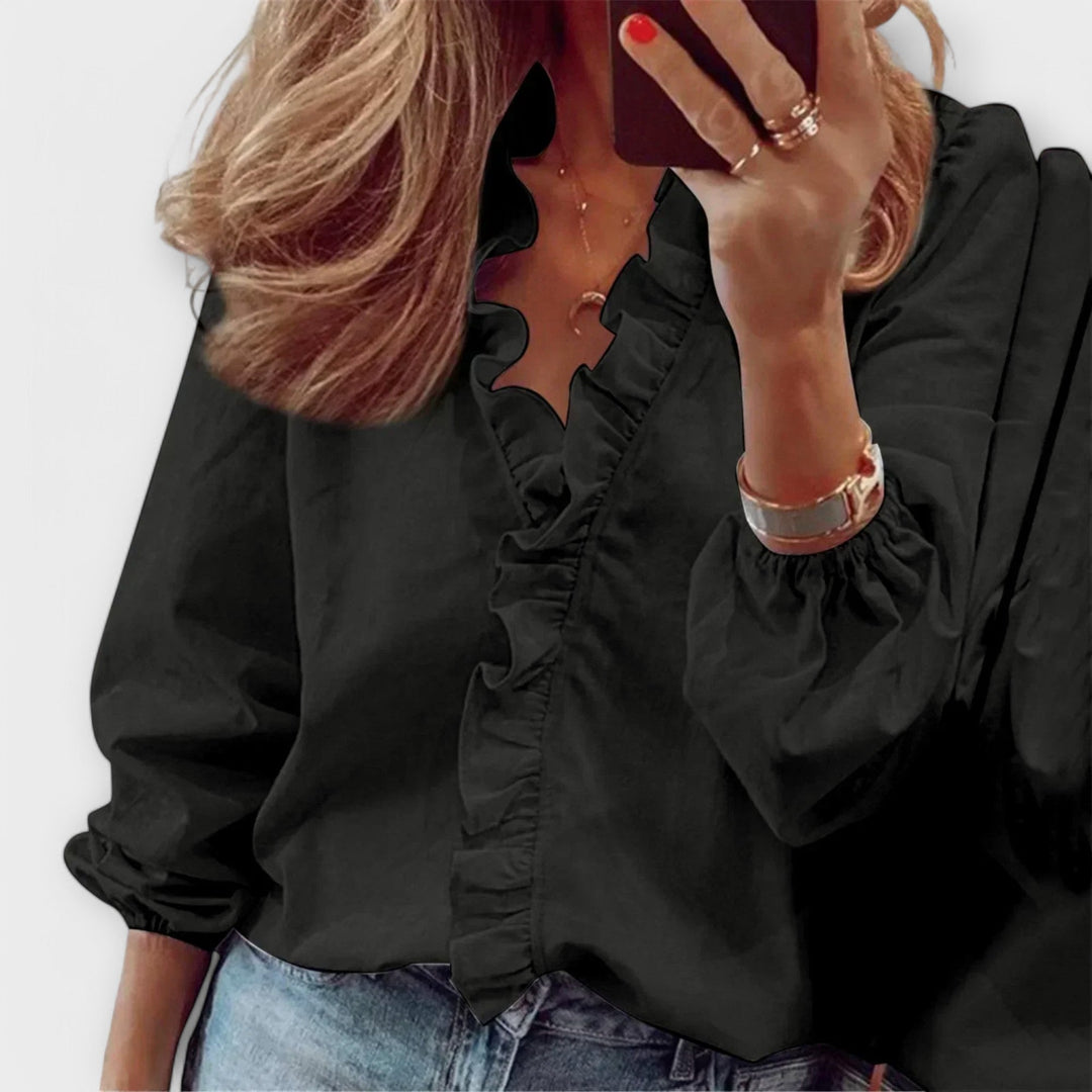 Marianne - Elegant bluse med flæser