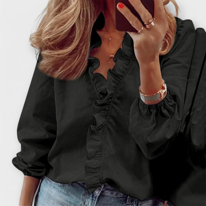 Marianne - Elegant bluse med flæser