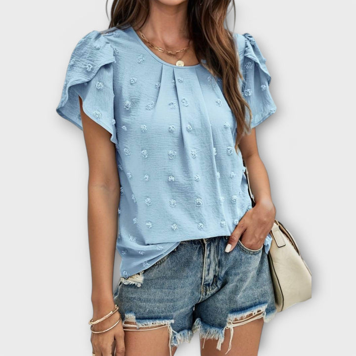 Lene - Den perfekte prikkede bluse